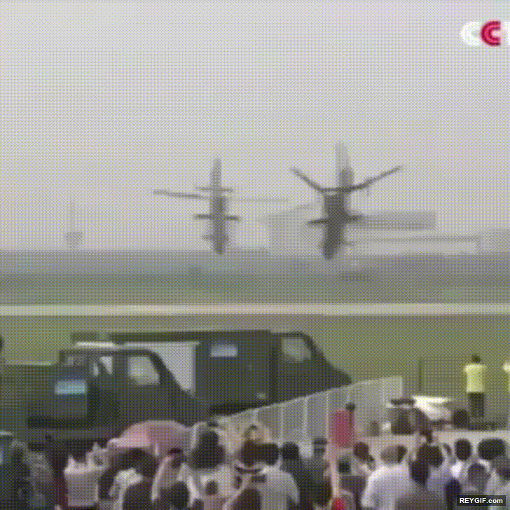 GIF animado (116347) Alguna vez habias imaginado dos helicopteros bailando