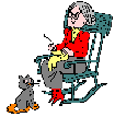 GIF animado (70690) Anciana tejiendo gato