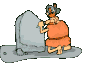 GIF animado (70517) Hombre prehistorico tallando roca
