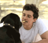 GIF animado (66786) Orlando bloom perro beso