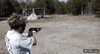 GIF animado (93612) Retroceso de un arma de fuego descripcion muy grafica y dolorosa